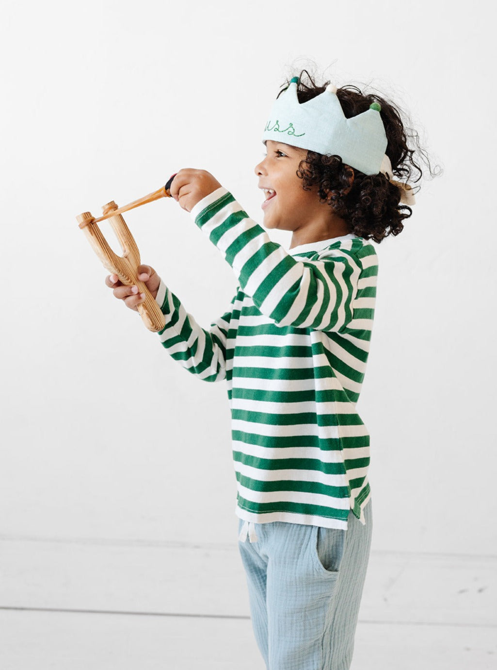 Boy wearing a handmade personalized crown