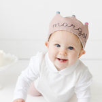 baby with first birthday crown