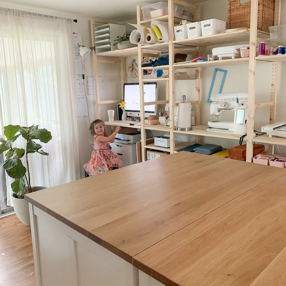 in home sewing space with ivar ikea furniture 
